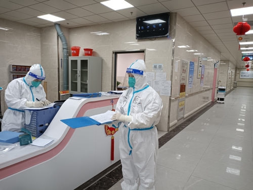 2吴富菊副主任完成长春市首例新冠感染孕妇剖宫产手术.jpg